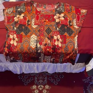 Red,orange blouse beautiful color or anywhere special.